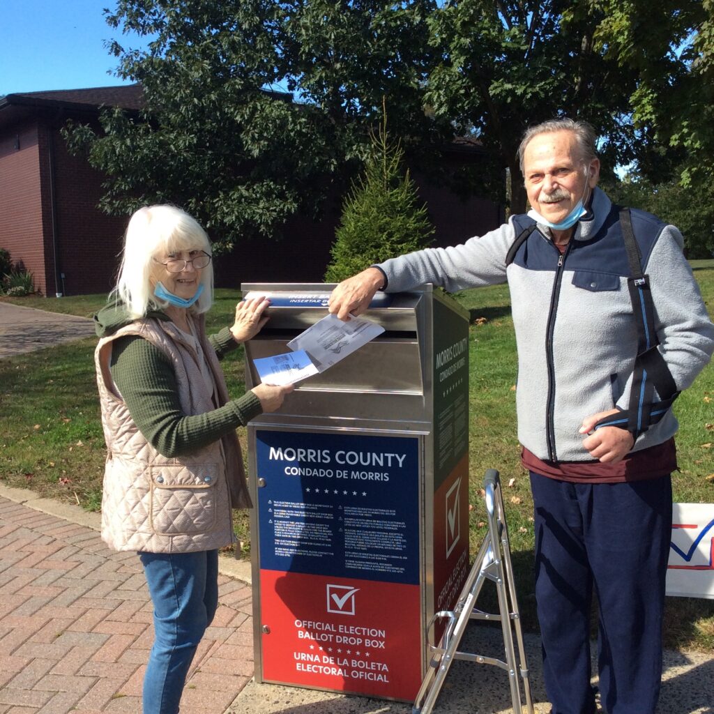 two voters at ballot drop box NJ
